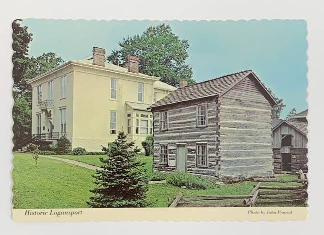 Vintage postcard of the Long Home and log cabin in Logansport