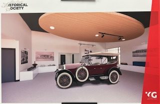 The ReVere automobile on display in a museum gallery